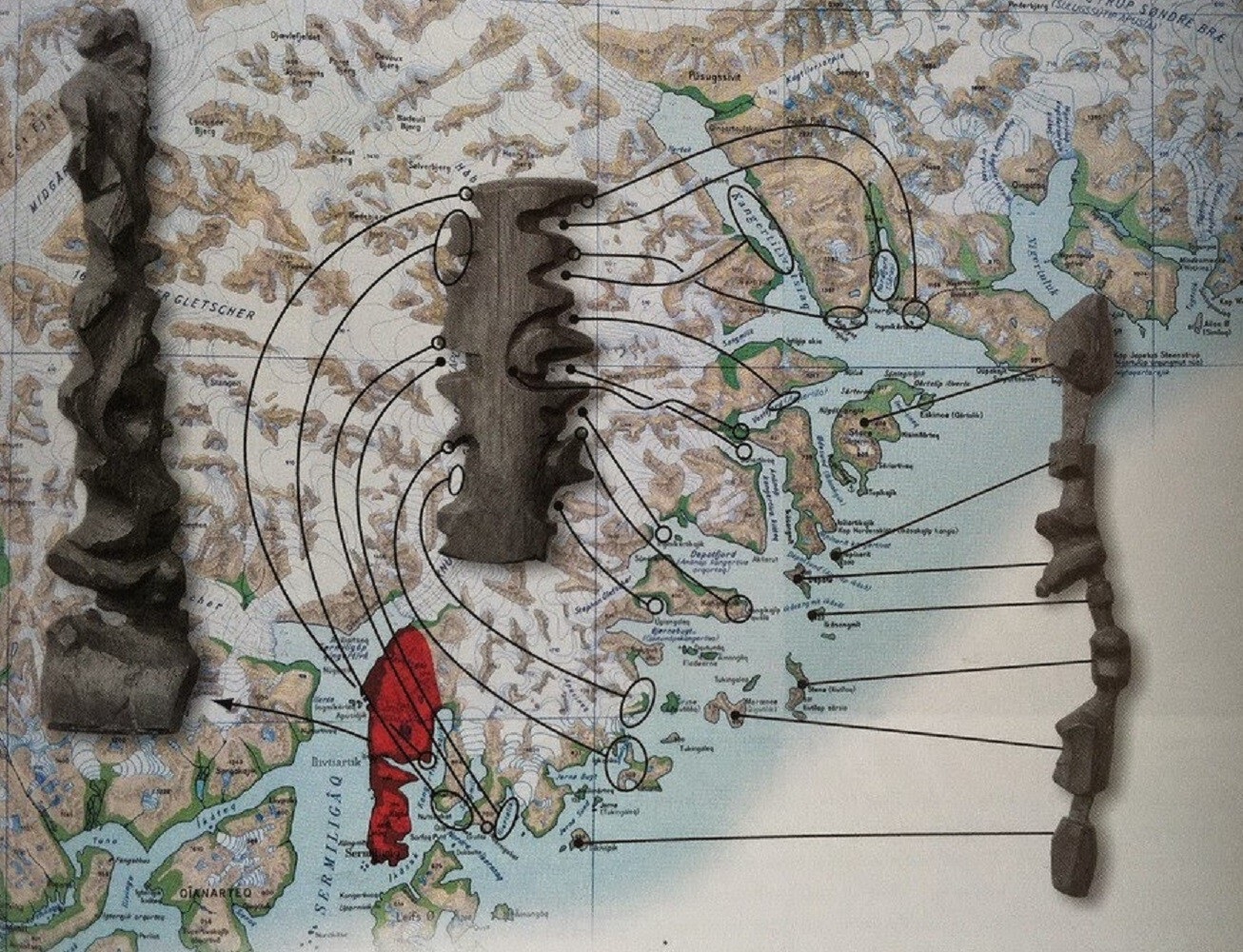Mapas de la costa este de Groenlandia tallados en madera